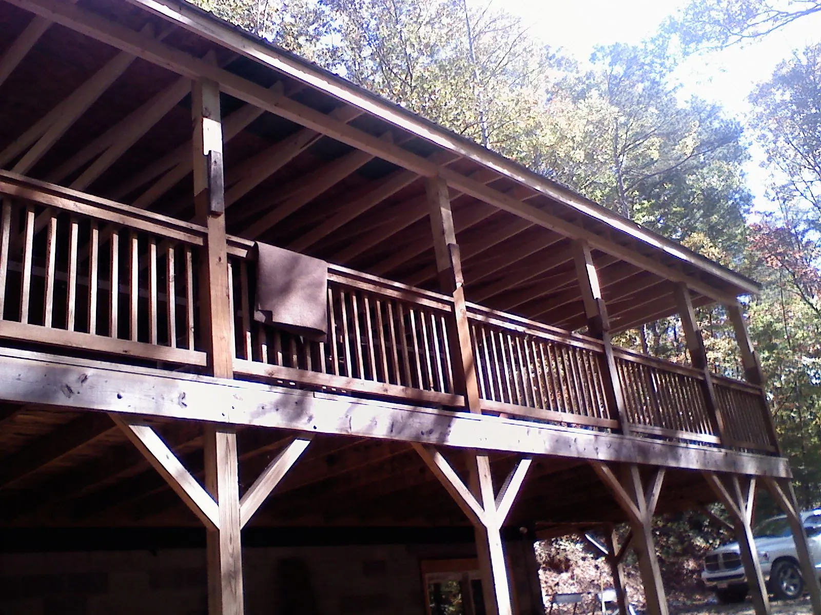 Timber framing under a new elevated porch and deck — Roof Leak Repair in Huntington Woods by Roofing Brothers